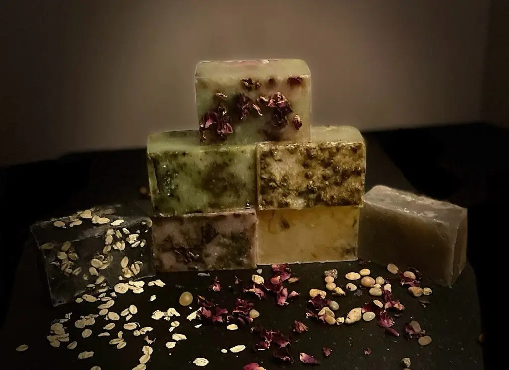 Handmade artisanal soap bars with dried flower petals, promoting skin radiant care.