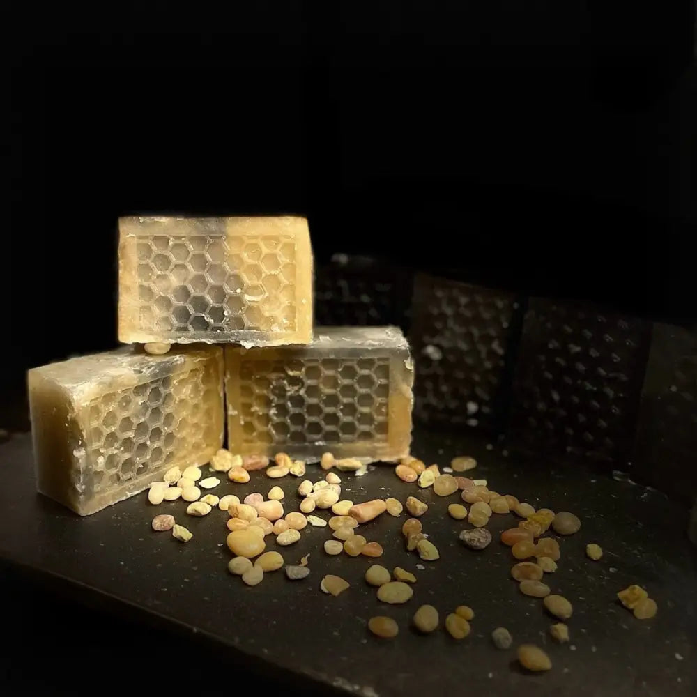 Blocks of honeycomb soap and beeswax pellets in a divine skincare bundle