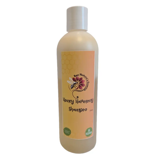 White plastic bottle of Honey Harmony Shampoo for natural hair care in Divine Skincare Bundle